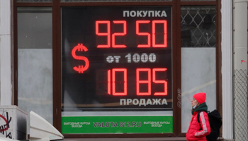 Dollar/ruble rates shown at an exchange office in St. Petersburg, February 28 (Anatoly Maltsev/EPA-EFE/Shutterstock)