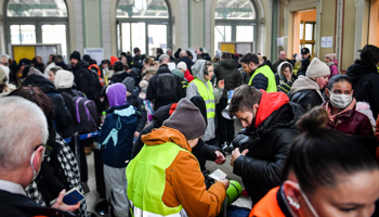 Ukrainian refugees fleeing the war in the railway station of the small border town of Przemysl, Poland, March 3 (Nicola Marfisi/AGF/Shutterstock)