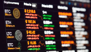 Cryptocurrency exchange to dollar rate on monitor display (Shutterstock / PixieMe)