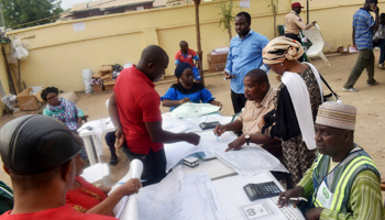 Independent National Electoral Commission (INEC) returning officers from different wards collating results of the 2019 presidential and national assembly elections (STR/EPA-EFE/Shutterstock)