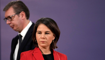 German Foreign Minister Annalena Baerbock (R) and Serbian President Aleksandar Vucic attend a news conference, during her one-day official visit to Serbia, Belgrade, March 11 (Darko Vojinovic/AP/Shutterstock)
