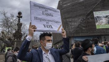 A Vox supporter with a sign saying "Spanish-Americans for Spain, Spanish-Americans for VOX" (Paco Freire/SOPA Images/Shutterstock)