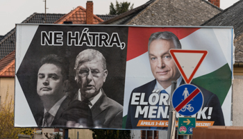Fidesz party election poster for showing (from left to right) opposition leader Peter Marki-Zay with former Prime Minister Ferenc Gyurcsany behind him, and (in colour) Fidesz leader Viktor Orban, March 18 (Tomas Tkacik/SOPA Images/Shutterstock)
