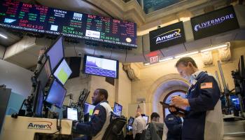 Traders work on the floor of the New York Stock Exchange (Xinhua/Shutterstock)