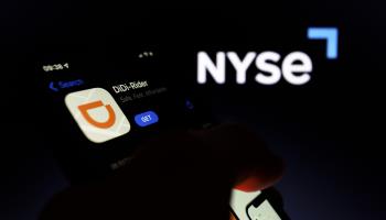 DiDi app icon and New York Stock Exchange logo (Andre M Chang/ZUMA Press Wire/Shutterstock)
