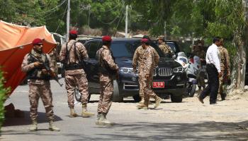 Security personnel standing guard at the scene of the April 26 Karachi attack, claimed by the Balochistan Liberation Army (Shahzaib Akber/EPA-EFE/Shutterstock)