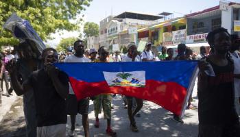 Demonstrators march demanding peace and security in Port-au-Prince. May 6, 2022 (Odelyn Joseph/AP/Shutterstock)