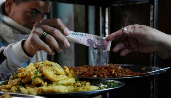 Buying food in Cairo (Amr Nabil/AP/Shutterstock)