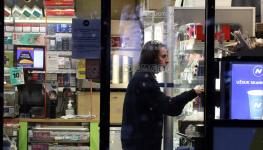 A woman at a shop in Vilnius the day the statistics office announced annual inflation reaching 15.6%, Vilnius, March 30 (Chine Nouvelle/SIPA/Shutterstock)