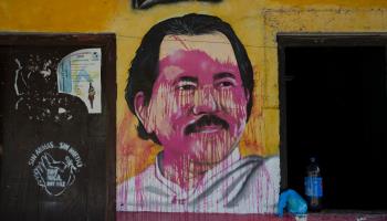A defaced mural of Ortega at an FSLN campaign house in Catarina, the morning after anti-government protests. May, 2018 (Moises Castillo/AP/Shutterstock)