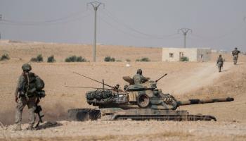 Turkish tanks and troops deployed near Syrian town of Manbij for Operation Peace Spring, October 15, 2019, Manibj, Syria (Ugur Can/AP/Shutterstock)