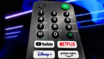 A TV remote control with buttons for streaming services, May 30 2022 (Beata Zawrzel/NurPhoto/Shutterstock)