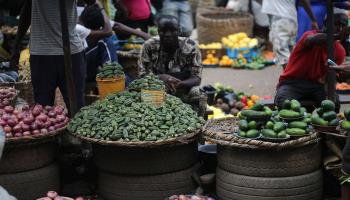 A food vendor at the Mile 12 International Market in Lagos (Akintunde Akinleye/EPA-EFE/Shutterstock)