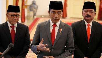 President Joko 'Jokowi' Widodo (centre) alongside Trade Minister Zulkifli Hasan (left) and Agrarian Affairs and Spatial Planning Minister Hadi Tjahjanto (right) following an inauguration ceremony for the two new cabinet appointees on June 15 (Achmad Ibrahim/AP/Shutterstock)

