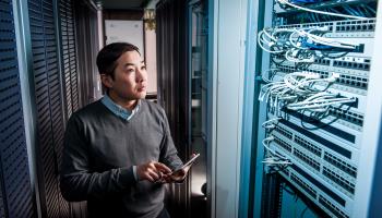 Chinese engineer in the server room of a technology firm (Shutterstock)