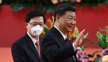 Hong Kong Chief Executive John Lee (left) and Chinese President Xi Jinping (Selim Chtayti/AP/Shutterstock)