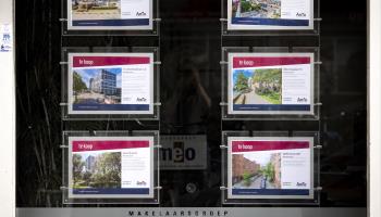 Houses advertised for sale in an estate agents window, Amsterdam, Netherlands (Hollandse Hoogte/Shutterstock)