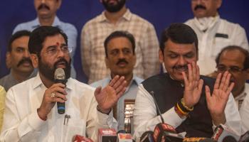 Eknath Shinde of the Shiv Sena party (left) and Devendra Fadnavis of the Bharatiya Janata Party (right) interacting with media before being sworn in as chief minister and deputy chief minister, respectively, of Maharashtra state last month (Satish Bate/Hindustan Times/Shutterstock)