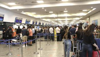 Passengers queuing for domestic flights at Jorge Newbery airport in Buenos Aires (Niyi Fote/via ZUMA Press Wire/Shutterstock)