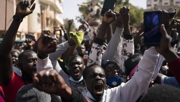 Demonstrators protesting the arrest of opposition leader Ousmane Sonko in March 2021 (Leo Correa/AP/Shutterstock)