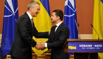 NATO Secretary General Jens Stoltenberg speaks to Ukrainian President Volodymyr Zelensky (Shutterstock)