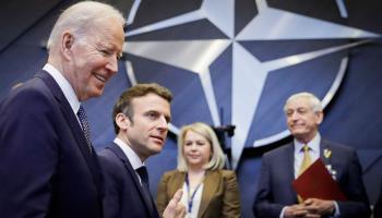 US President Joe Biden and French President Emmanuel Macron arrive together for a NATO Summit in March (Oliver Hoslet/EPA-EFE/Shutterstock)
