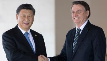 Chinese President Xi Jinping (l) meeting Brazilian counterpart Jair Bolsonaro in Brasilia in 2019 (Pavel Golovkin/AP/Shutterstock)