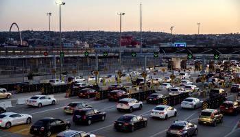 Cars drive from San Diego into Tijuana at the San Ysidro border crossing (Ariana Drehsler/UPI/Shutterstock)