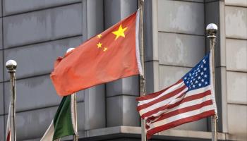 US and China flags at a manufacturing plant in Shanghai, September 7, 2020 (Alex Plavevski/EPA-EFE/Shutterstock)