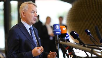 Finland's Foreign Minister Pekka Haavisto speaks with the media as he arrives for a meeting of EU foreign ministers at the Prague Congress Center in Prague, Czech Republic, on August. 31 (Petr David Josek/AP/Shutterstock)