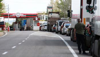 A line of vehicles waiting to cross the Moldova-Transnistria boundary (Aurel Obreja/AP/Shutterstock)
