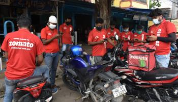 Delivery workers of the digital labour platform Zomato in Kolkata, India (Shutterstock)
