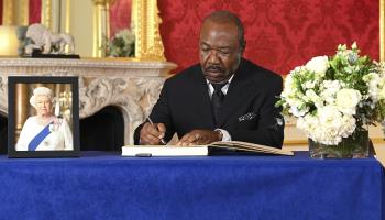Gabonese President Ali Bongo Ondimba signs a condolence book for Queen Elizabeth II (Jonathan Hordle/AP/Shutterstock)