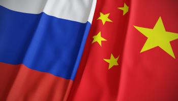 Russian and Chinese flags (Shutterstock)