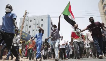 Sudanese protesters march to condemn last October's coup, June 30, 2022 (Marwan Ali/AP/Shutterstock)