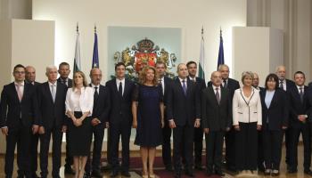 Bulgarian President Rumen Radev (fifth from right, front row) with members of the newly appointed caretaker government headed by Galab Donev (fourth from right, front row) which took office to organise the parliamentary elections on October 2, Sofia, August 2 (Xinhua/Shutterstock)