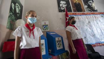 Two girls guard a ballot box during the referendum on Cuba's new family code. Havana, September 25 (Yander Zamora/EPA-EFE/Shutterstock)