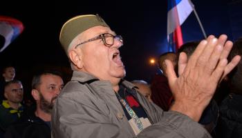 Man in a traditional Serbian cap joins a thousands-strong demonstration held for the second time in a week, protesting that Milorad Dodik had rigged his election to the Republika Srpska presidency during the Bosnian general election, Banja Luka, October 9 (Radivoje Pavicic/AP/Shutterstock)

