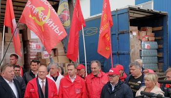 Communist Party aid consignment for Russian proxies in eastern Ukraine. Party leader Gennady Zyuganov is second left in front row (Maxim Shipenkov/EPA-EFE/Shutterstock)