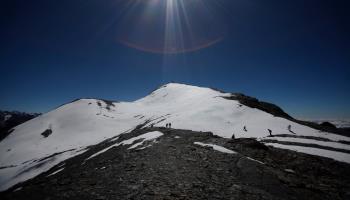 People walk along the Cordillera Real of the Andes mountains, Bolivia (Juan Karita/AP/Shutterstock)