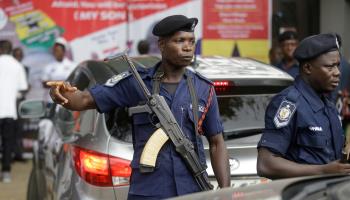 Ghanaian policeman directing traffic (Sunday Alamba/AP/Shutterstock)