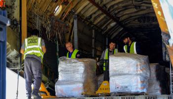 Workers unload aid donated by Russia for earthquake victims in Kabul, Afghanistan, July 20 (Stringer/EPA-EFE/Shutterstock)