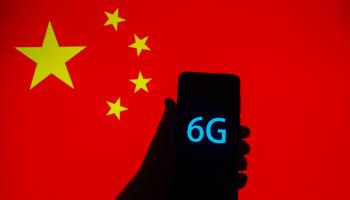 6G sign is seen on the smartphone screen with China national flag in the background. (Beata Zawrzel/NurPhoto/Shutterstock)