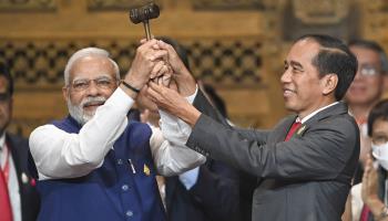 Indonesian President Joko 'Jokowi' Widodo (right) symbolically handing over the presidency of the G20 to Indian Prime Minister Narendra Modi (left) at the conclusion of the November 15-16 G20 Summit in Bali (EyePress News/Shutterstock)
