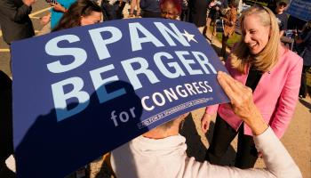 Democrat Abigail Spanberger greets a supporter while campaigning in her Virginia district, October 11 2022 (Steve Helber/AP/Shutterstock)