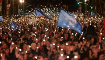 Protesters raise their mobile phone flashlights during an opposition rally against the government's alleged corruption and rising prices, Tirana, November 12 (Franc Zhurda/AP/Shutterstock)