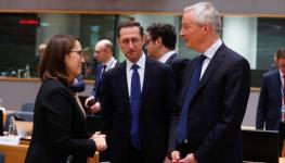 Polish Finance Minister Magdalena Rzeczkowska (left), Hungarian Finance Minister Mihaly Varga (centre) and French Finance Minister Bruno Le Maire (right), at the start of an Economic and Financial Affairs Council in Brussels, December 6 (Stephanie Lecocq/EPA-EFE/Shutterstock)

