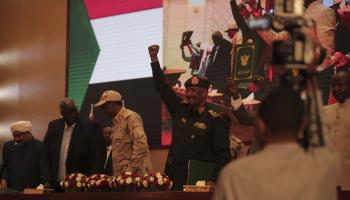 General Abdel Fattah al-Burhan celebrates after signing a political settlement with the FFC, Khartoum, December 5, 2022 (Marwan Ali/AP/Shutterstock)