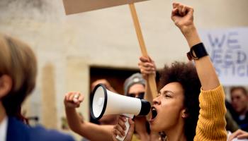 A young African American woman at an anti-racism protest in the United States (Shutterstock)