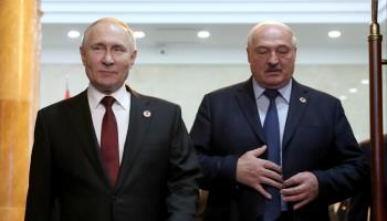 Russian President Vladimir Putin (L) and Belarusian leader Alexander Lukashenka attending a Eurasian Economic Union meeting in Kyrgyzstan, December 9 (IGOR KOVALENKO/EPA-EFE/Shutterstock)